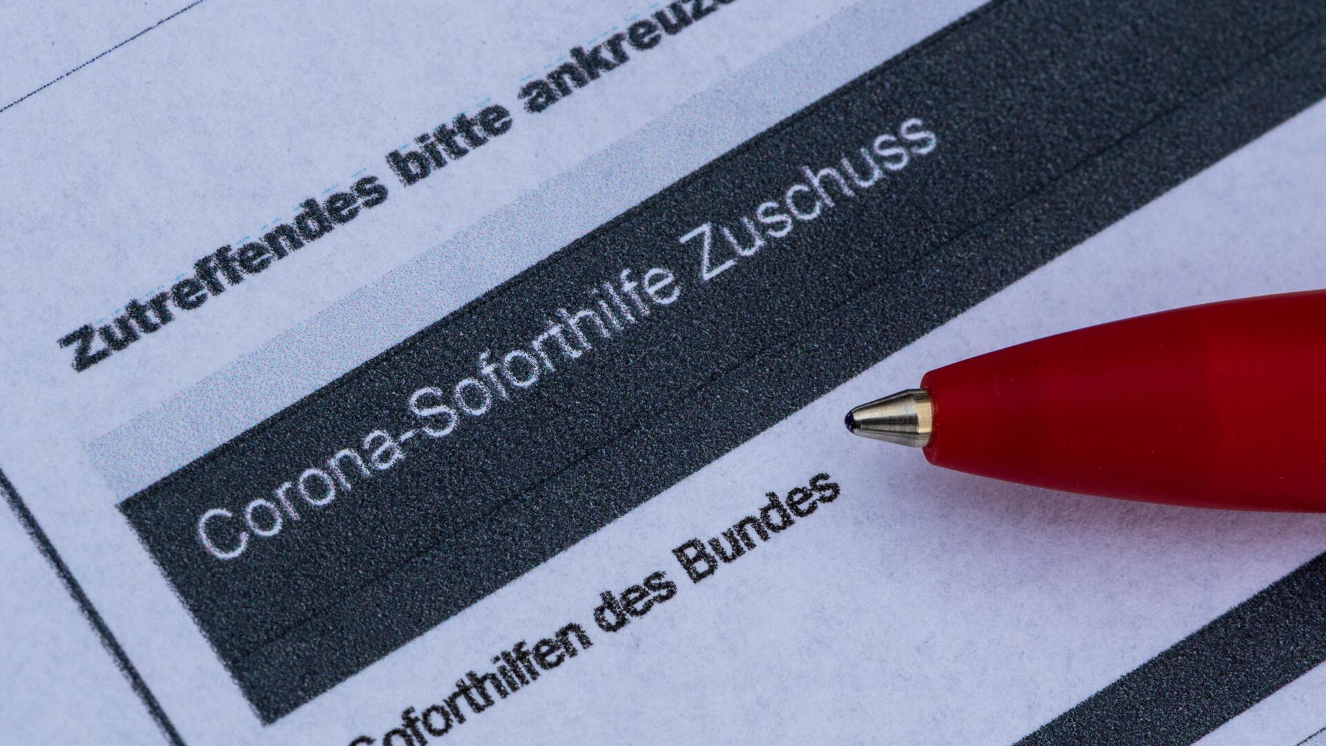 Antragsformular mit Kugelschreiber