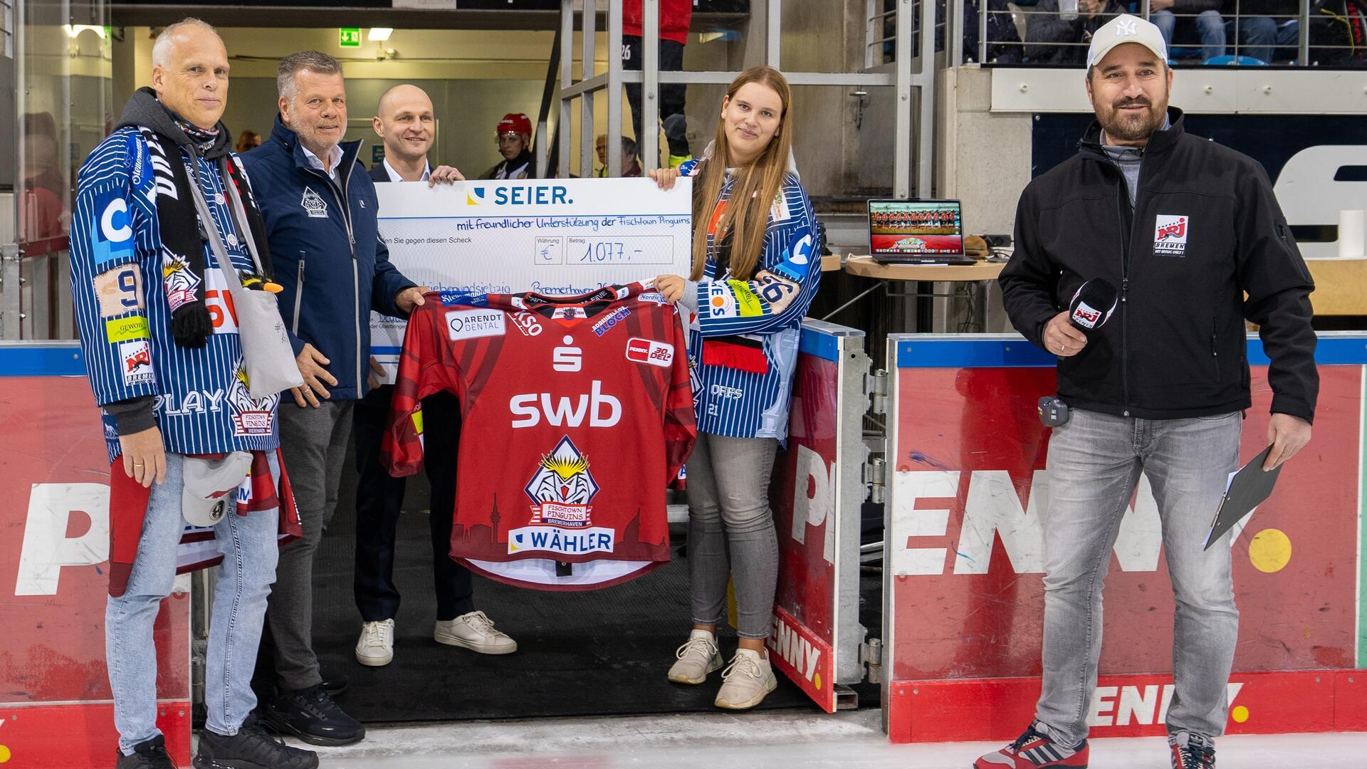 Seier Gruppe und Fischtown Pinguins spenden für guten Zweck